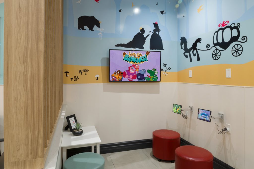 AXIS Dental Area - Children waiting room with TV and Tablet Game Stations